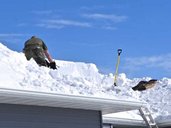 Call The Roof Doctors for snow and ice removal from your Maine home